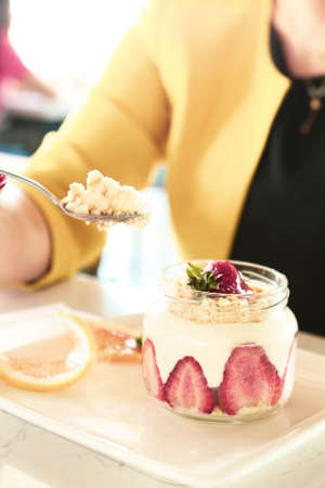 Very delicious dessert in jars, sweet and cakes in jarsの写真素材