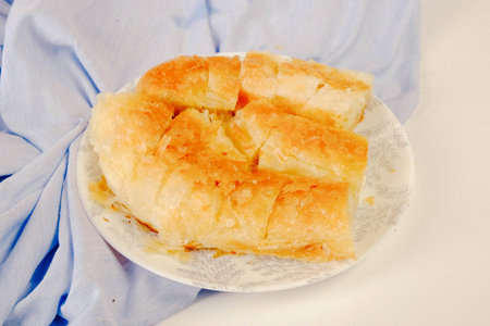 delicious layered pastry with cheese fillingの写真素材