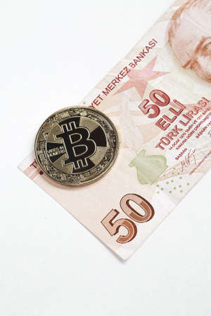 Turkish lira banknotes and bitcoin coinの写真素材
