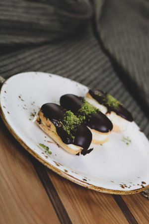 Board with delicious cake on table