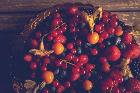 Board with delicious cake on tableの写真素材