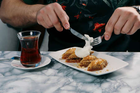Traditional turkish dessert baklava with cashew, walnuts. Homemade baklava with nuts and honey.の写真素材