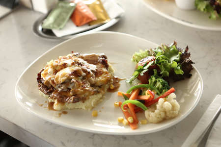 Tasty chicken meal on the tableの写真素材