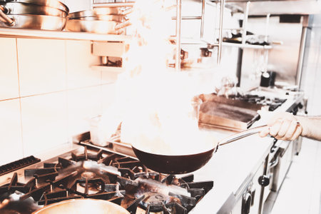 pot with cake on the fire stove cookingの写真素材