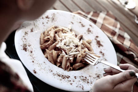 Tasty appetizing classic Italian pasta with a delicious sauce.の写真素材