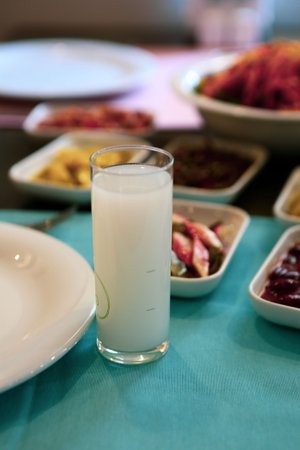 Turkish and Greek Traditional Dinning Table with Special Alcohol Drink Raki. Ouzo and Turkish Raki...