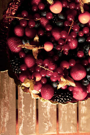 Board with delicious cake on tableの写真素材