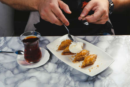 Traditional turkish dessert baklava with cashew, walnuts. Homemade baklava with nuts and honey.の写真素材