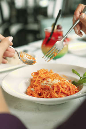 Tasty appetizing classic Italian pasta with a delicious sauce.の写真素材