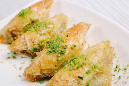 Traditional turkish dessert baklava with cashew, walnuts. Homemade baklava with nuts and honey.の写真素材