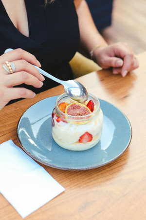 Very delicious dessert in jars, sweet and cakes in jarsの写真素材