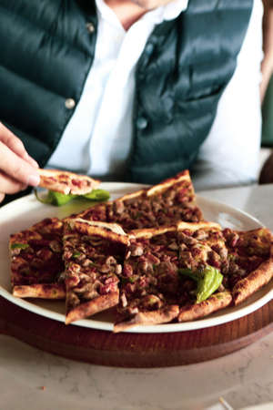 Traditional turkish baked dish pide. Turkish pizza pide, Middle eastern appetizers. Turkish cuisine. Pita with meat fillingの写真素材