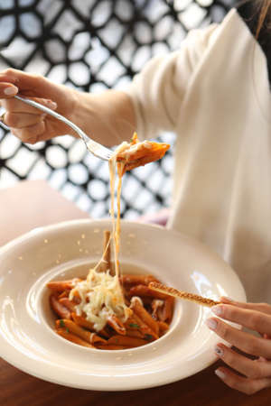 Tasty appetizing classic Italian pasta with a delicious sauce.の写真素材