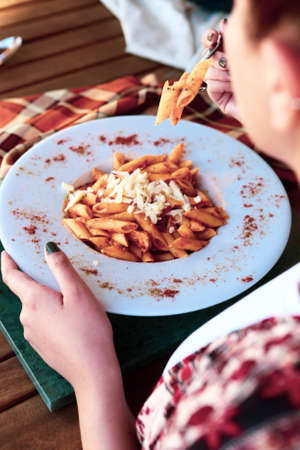 Tasty appetizing classic Italian pasta with a delicious sauce.の写真素材