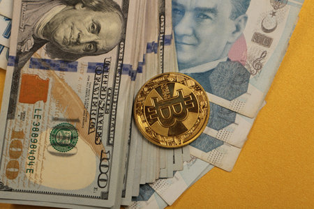 Turkish lira banknotes, US Dollars and bitcoin coin