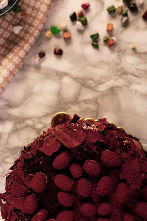 Board with delicious cake on tableの写真素材