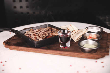 Delicious meat meal on the tableの写真素材