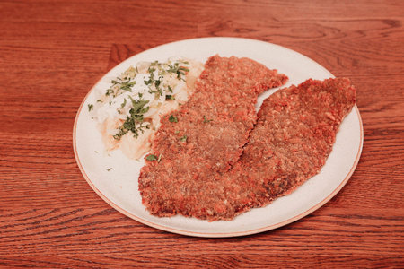 Delicious schnitzel served with french fries