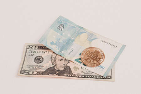Euro, US Dollars and bitcoin coinの写真素材