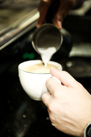 barista brewing coffee in the coffee roomの写真素材