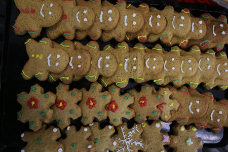 Gingerbread cookies in shape of man on the table.