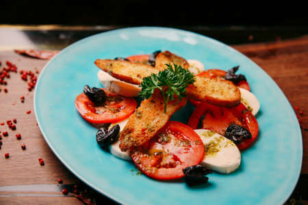 Cooked salmon with some vegetablesの写真素材