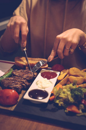 Delicious meat meal on the tableの写真素材