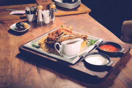 Delicious meat meal on the tableの写真素材