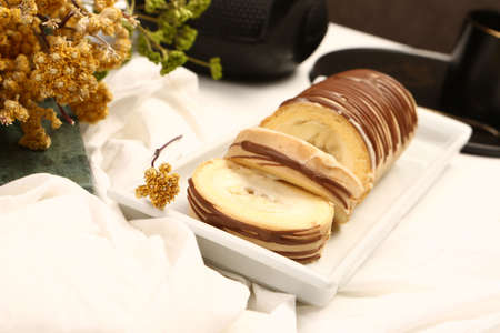 A slice of delicious cake and a cup of coffeeの写真素材