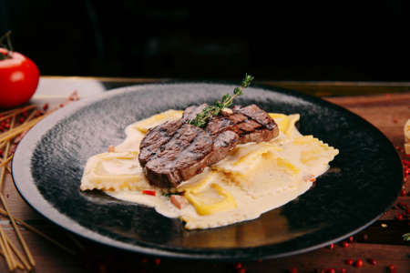 Delicious meat meal on the tableの写真素材