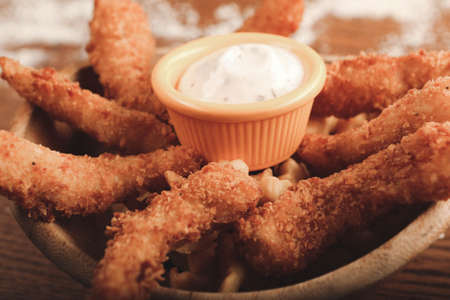 Delicious crispy fried chicken fingers.の写真素材
