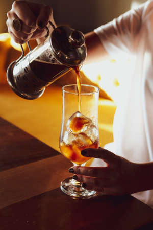 barista brewing coffee in the coffee roomの写真素材