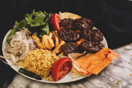 Delicious meatballs with french friesの写真素材