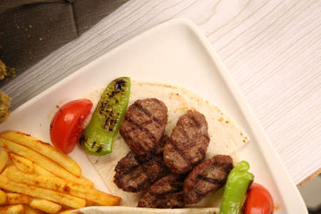 Delicious meatballs with french friesの写真素材