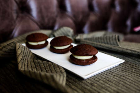 Assorted selection of tea biscuits and chocolate chip cookiesの写真素材