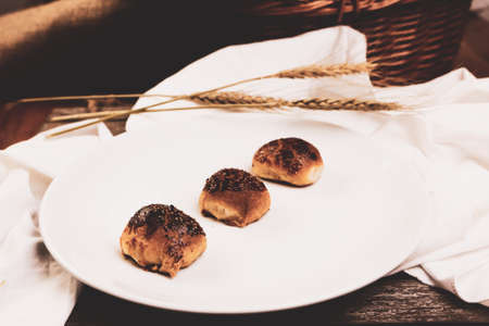 Assorted selection of tea biscuits and chocolate chip cookiesの写真素材