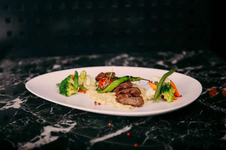 Delicious meatballs with french friesの写真素材