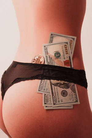 Golden Bitcoin and Usd dollars with sexy womanの写真素材
