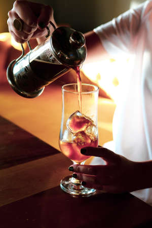 barista brewing coffee in the coffee roomの写真素材