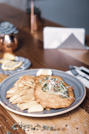 Delicious schnitzel served with french fries