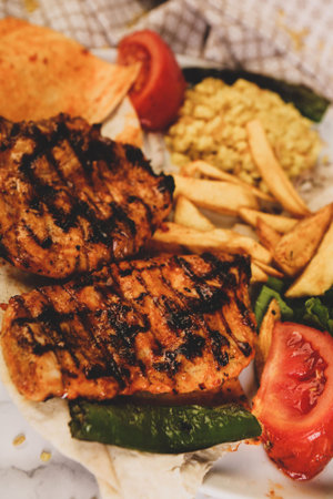 Tasty chicken meal on the table
