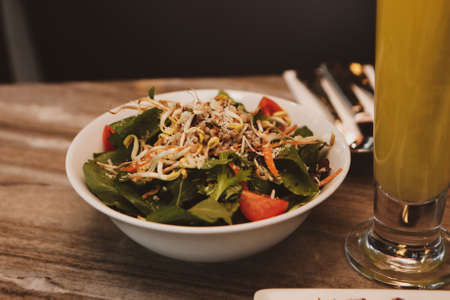Fresh salad plate with mixed greensの写真素材