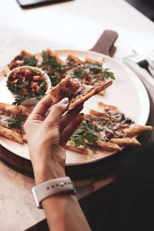 Traditional turkish baked dish pide. Turkish pizza pide, Middle eastern appetizers. Turkish cuisine. Pita with meat fillingの写真素材
