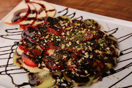 Delicious waffles with chocolate sauce