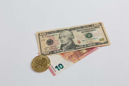 Euro, US Dollars and bitcoin coinの写真素材