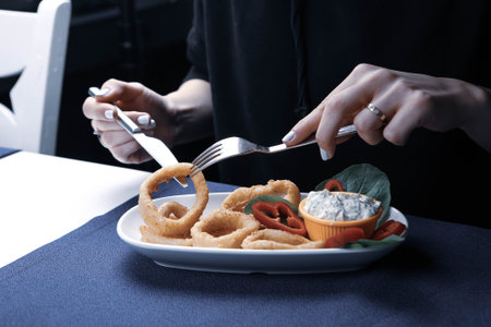 fried seafood calamar or calamaris with sauceの写真素材