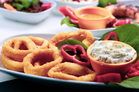 fried seafood calamar or calamaris with sauce