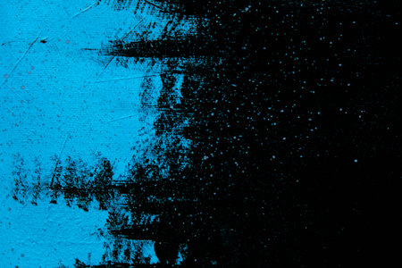 Grunge blue background with some spots and stains on it.の写真素材