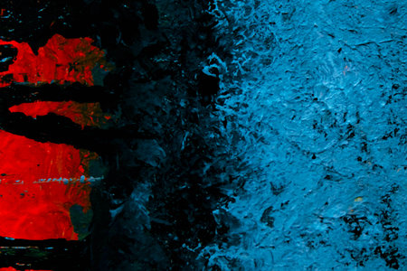 abstract blue, red and black background texture with some damage on itの写真素材