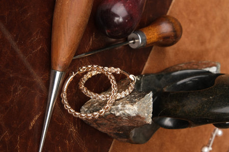 Jewelry, jewelry and tools on the table, close-up